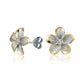 The photo shows a pair of yellow gold vermeil sterling silver rhodium plated plumeria flower stud earrings with cubic zirconia stones in the center.