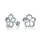 The photo is a pair of sterling silver hibiscus stud earrings with cubic zirconia.