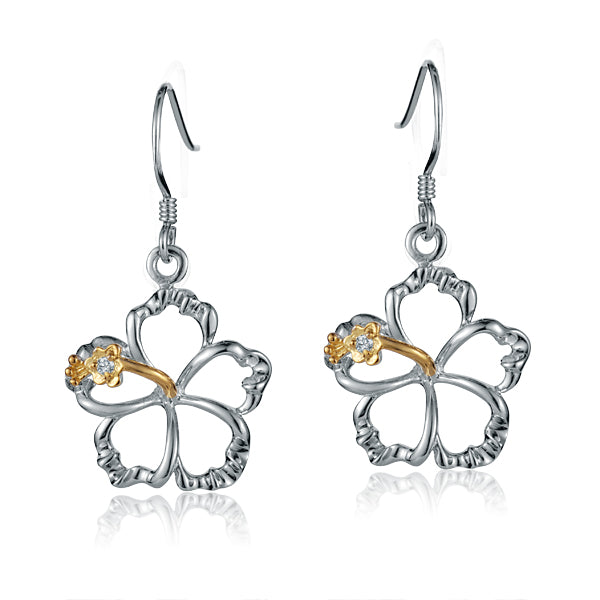 The photo shows a pair of sterling silver hook hibiscus earrings with details in yellow gold vermeil and a clear eco-gem.