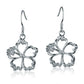 The picture is a pair of sterling silver hook hibiscus earrings with details in white gold vermeil and a clear eco-gem.