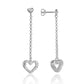 The photo shows a pair of sterling silver heart dangle stud earrings. 