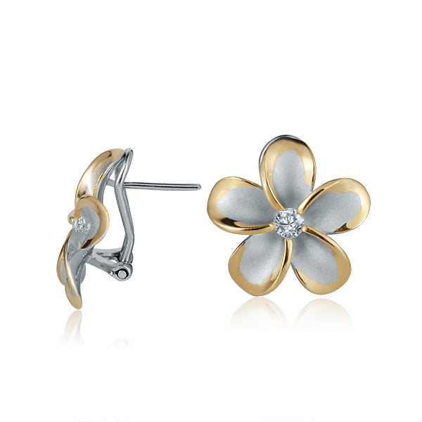 The photo is a pair of yellow gold vermeil sterling silver rhodium plated plumeria flower clip earrings with cubic zirconia gems in the center. 