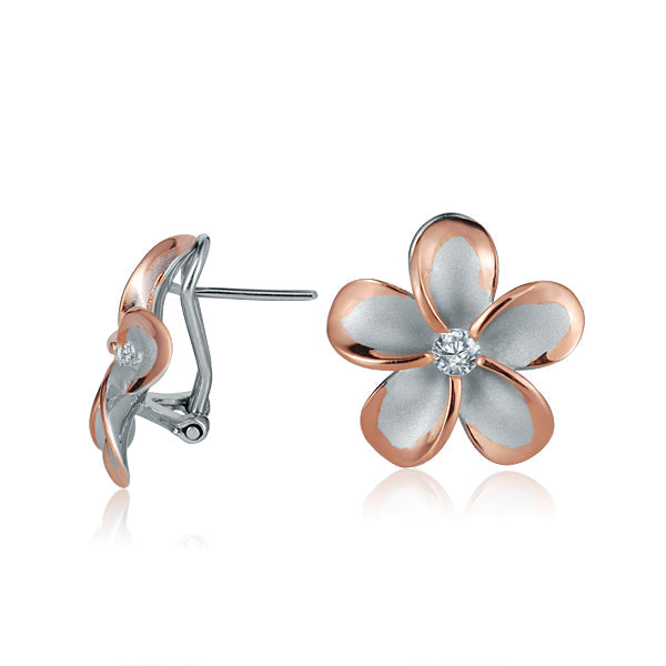 The photo shows a medium size of rose gold vermeil and sterling silver rhodium plated flower clip earrings with cubic zirconia gems.