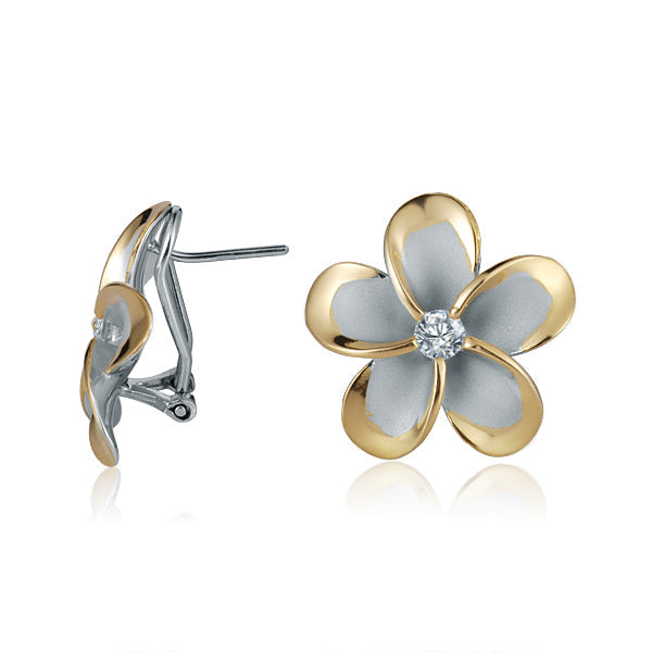 The photo is a medium size pair of yellow gold vermeil and sterling silver rhodium plated plumeria clip earrings with cubic zirconia stones. 