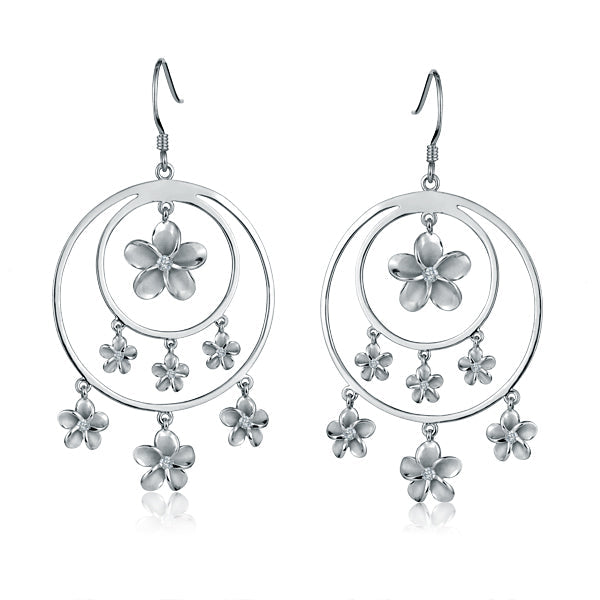 The photo shows a pair of sterling silver rhodium plated double circle hook earrings featuring seven plumerias with cubic zirconia. 