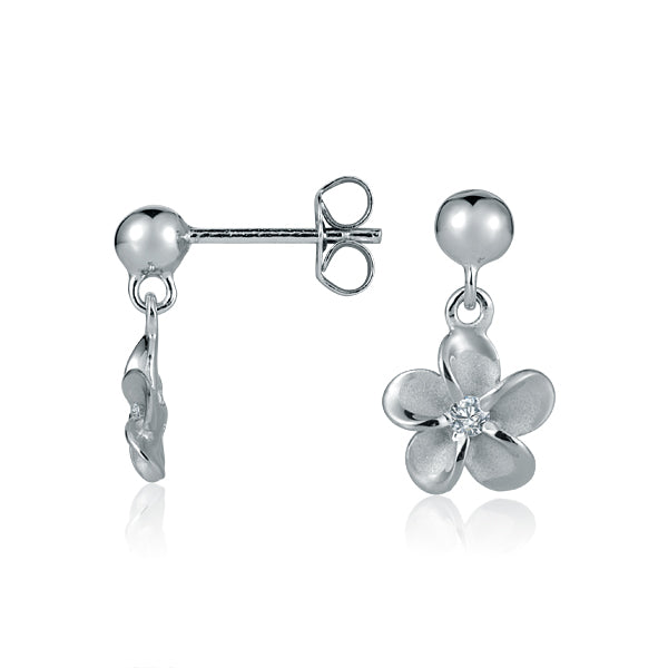 The photo is a pair of white gold vermeil plumeria stud earrings with cubic zirconia. 