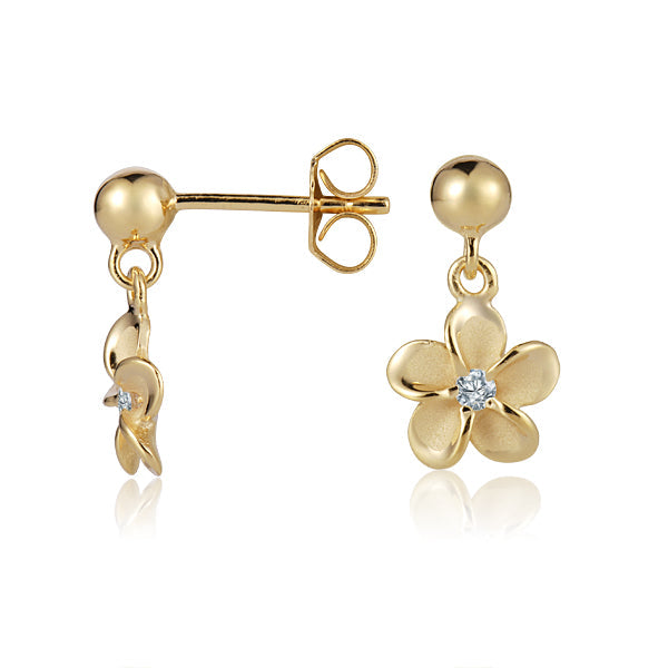 The photo is a pair of yellow gold vermeil plumeria stud earrings with cubic zirconia. 