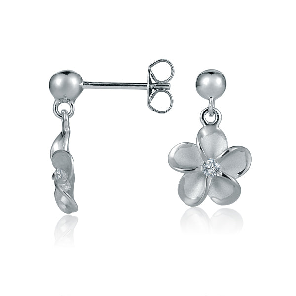 The photo is a pair of white gold vermeil plumeria stud earrings with cubic zirconia. 