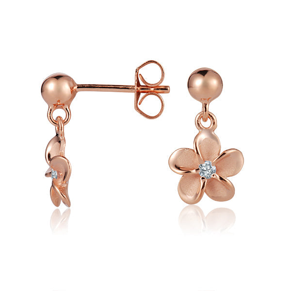 The photo is a pair of rose gold vermeil plumeria stud earrings with cubic zirconia. 