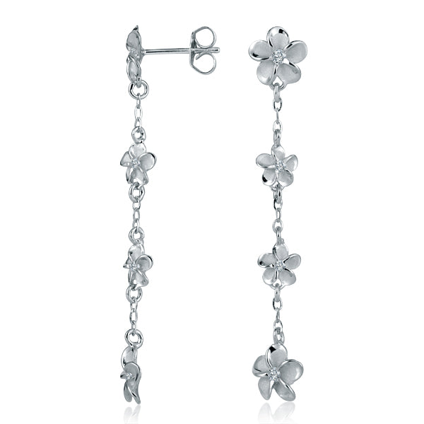 The photo shows a pair of white gold vermeil four plumeria dangle stud earrings with cubic zirconia gemstones. 