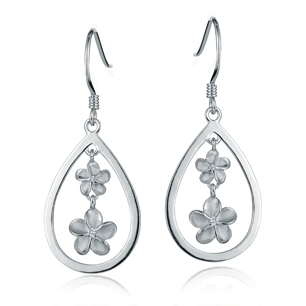 The picture is a pair of white gold vermeil plumeria hook earrings featuring a teardrop design with cubic zirconia. 