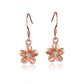 The picture show 8mm rose gold vermeil plumeria hook earrings with cubic zirconia.