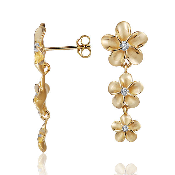 In the photo there is a pair of yellow gold vermeil cubic zirconia stud earrings.