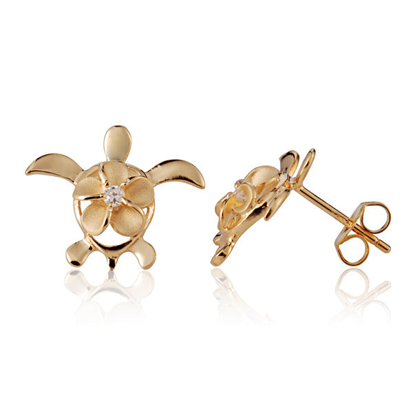 The photo shows a yellow gold vermeil sea turtle stud earrings paired with a plumeria design and cubic zirconia. 