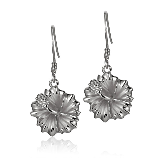 The photo shows a pair of white gold vermeil hibiscus hook earrings. 