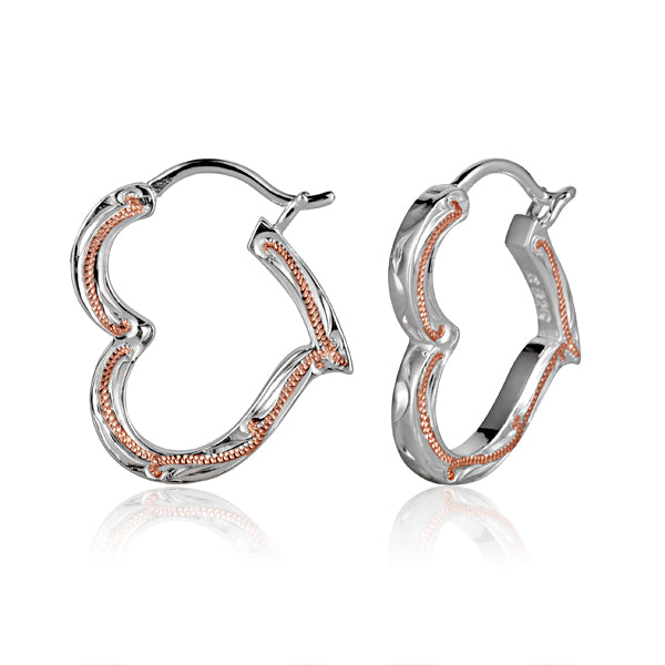 The picture show two-tone white and rose gold vermeil heart outline hook earrings with scroll engraving.