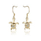 The photo shows a pair of yellow gold vermeil hook earrings featuring a plumeria motif with cubic zirconia. 